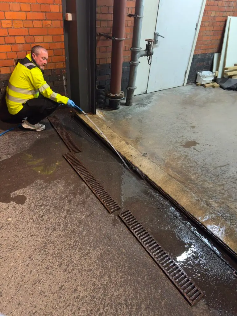 Jetting a cleared channel drain in a retail park service yard